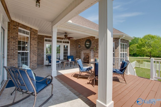 227 Lee Bowden Dr, Huntsville, AL 35806 - view of patio / terrace featuring ceiling fan, a deck, outdoor dining space, and fence
