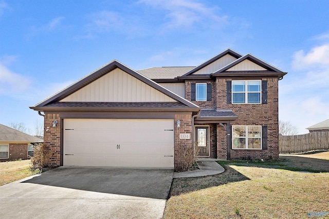 craftsman-style house with brick siding, fence, a garage, driveway, and a front lawn