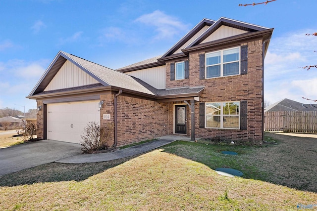 view of front of property featuring brick siding, fence, a garage, driveway, and a front lawn