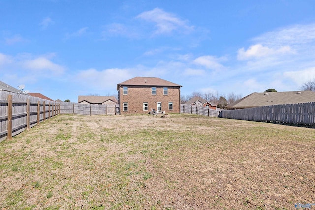 view of yard featuring a fenced backyard