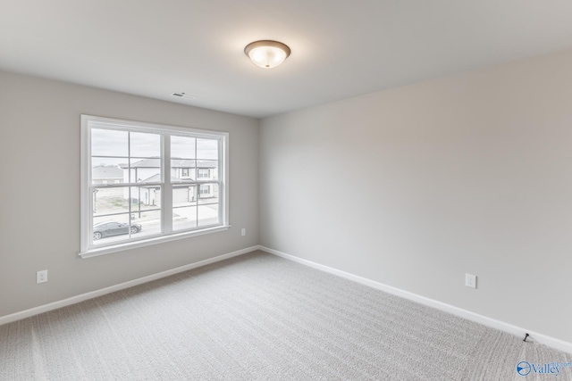 view of carpeted spare room