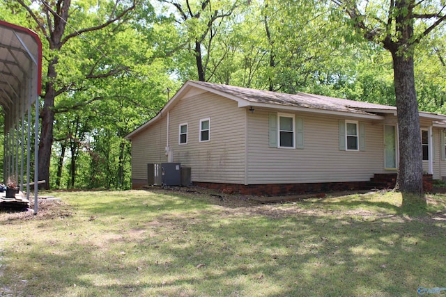 view of property exterior with a lawn