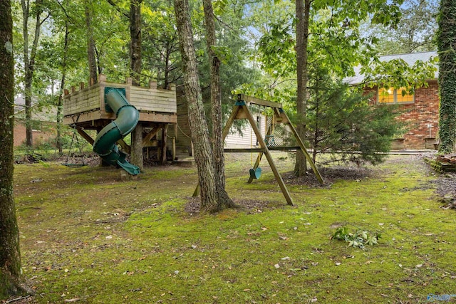 view of jungle gym with a lawn