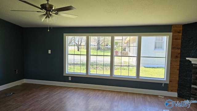 7739 Allison Loop, Athens, AL 35611 - interior space featuring ceiling fan, baseboards, wood finished floors, and a textured ceiling