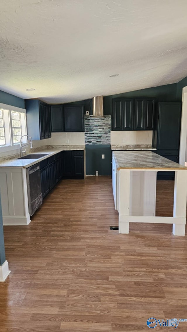 7739 Allison Loop, Athens, AL 35611 - kitchen featuring a sink, light countertops, wood finished floors, and dishwashing machine