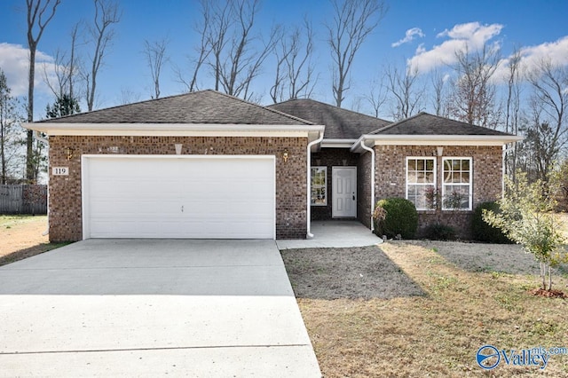 single story home with a garage