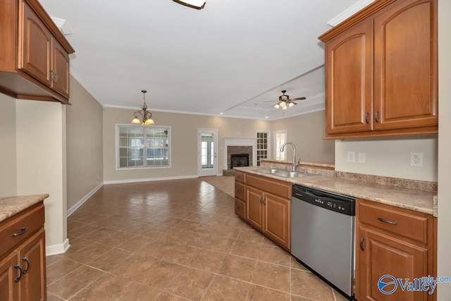 kitchen featuring stainless steel dishwasher, ornamental molding, ceiling fan with notable chandelier, sink, and decorative light fixtures