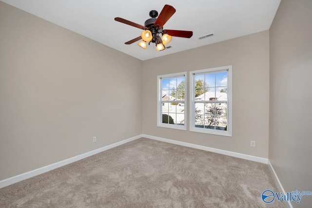 carpeted empty room with ceiling fan