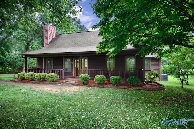 156 San Leonardo Way, Huntsville, AL 35811 - view of front facade featuring a chimney, a porch, a front lawn, and central AC unit