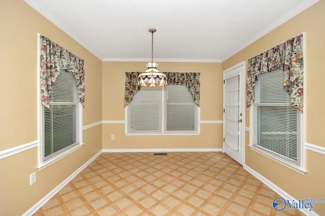 156 San Leonardo Way, Huntsville, AL 35811 - unfurnished dining area featuring light flooring, crown molding, baseboards, and a chandelier