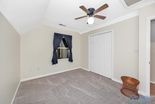156 San Leonardo Way, Huntsville, AL 35811 - unfurnished bedroom featuring carpet floors, a closet, lofted ceiling, baseboards, and ceiling fan