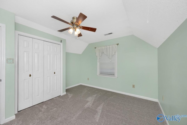 156 San Leonardo Way, Huntsville, AL 35811 - unfurnished bedroom with lofted ceiling, carpet flooring, a closet, baseboards, and a ceiling fan