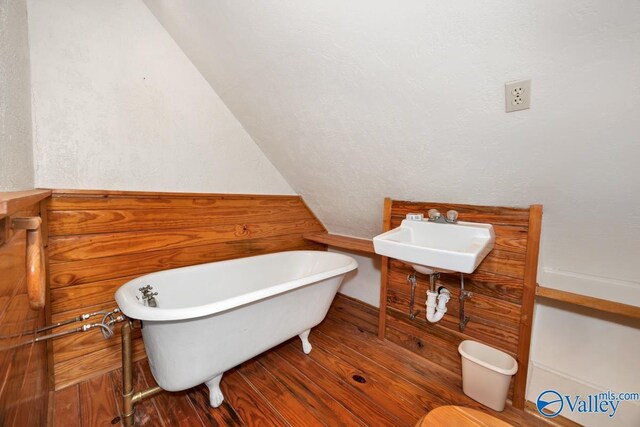 156 San Leonardo Way, Huntsville, AL 35811 - bathroom with a freestanding tub and a sink