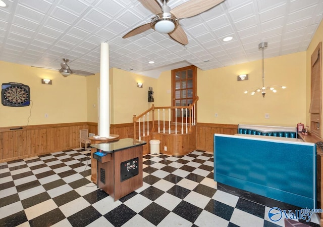 156 San Leonardo Way, Huntsville, AL 35811 - recreation room featuring wainscoting, wood walls, a ceiling fan, tile patterned floors, and ornate columns