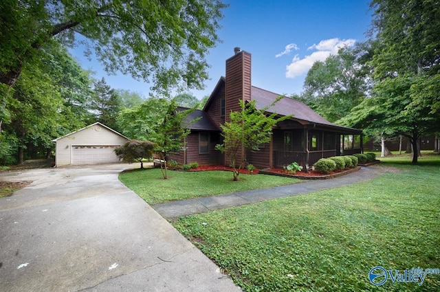 156 San Leonardo Way, Huntsville, AL 35811 - view of front of property with a chimney, an outdoor structure, a front lawn, a garage, and roof with shingles