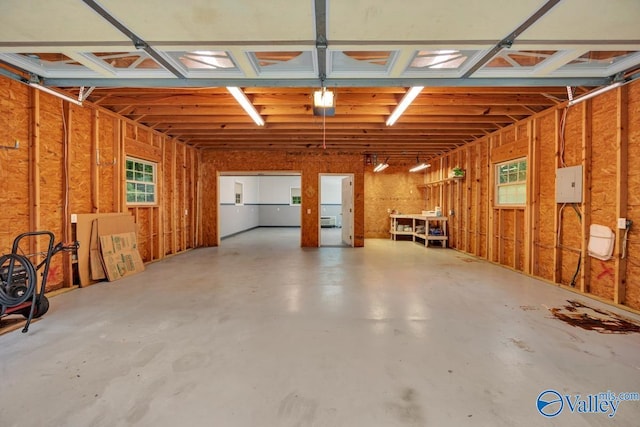 156 San Leonardo Way, Huntsville, AL 35811 - garage with a garage door opener and electric panel