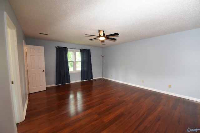 1208 SE Teenajo Dr SE, Huntsville, AL 35803 - empty room with wood finished floors, ceiling fan, and a textured ceiling