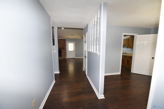 1208 SE Teenajo Dr SE, Huntsville, AL 35803 - corridor with dark wood-type flooring and baseboards