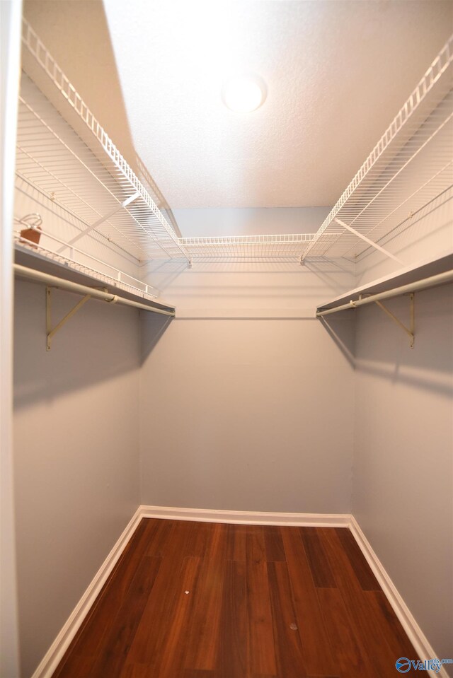 1208 SE Teenajo Dr SE, Huntsville, AL 35803 - spacious closet featuring dark wood-style flooring
