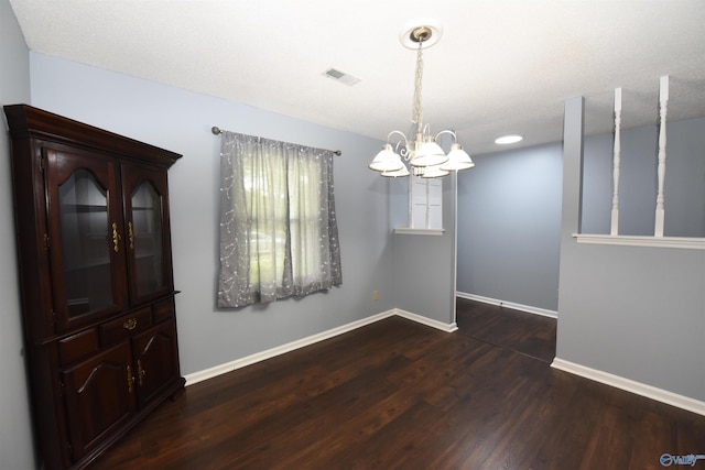 1208 SE Teenajo Dr SE, Huntsville, AL 35803 - unfurnished dining area with a chandelier and wood finished floors