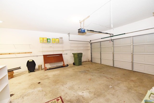 1208 SE Teenajo Dr SE, Huntsville, AL 35803 - garage featuring a garage door opener