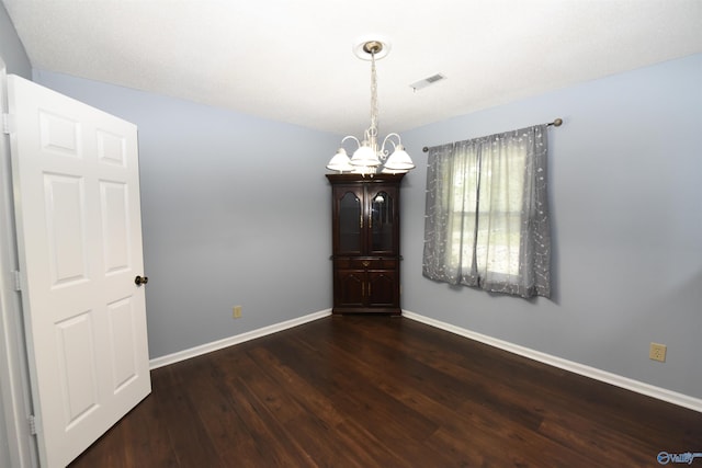 1208 SE Teenajo Dr SE, Huntsville, AL 35803 - spare room with a chandelier and wood finished floors