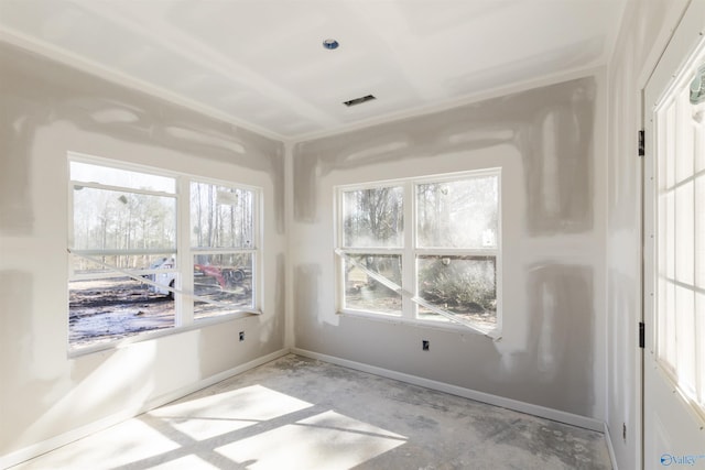 unfurnished sunroom with visible vents