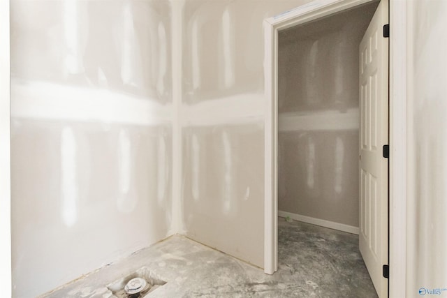 bathroom with concrete floors