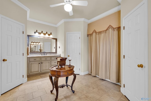 bathroom featuring tile patterned floors, ornamental molding, vanity, and ceiling fan