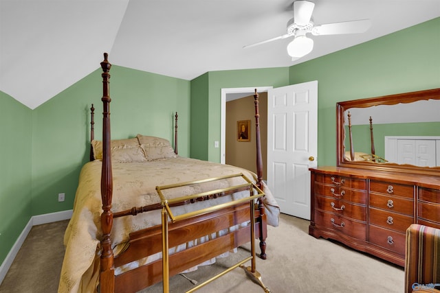 carpeted bedroom featuring lofted ceiling and ceiling fan