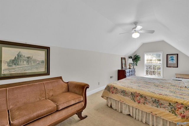 carpeted bedroom with lofted ceiling and ceiling fan