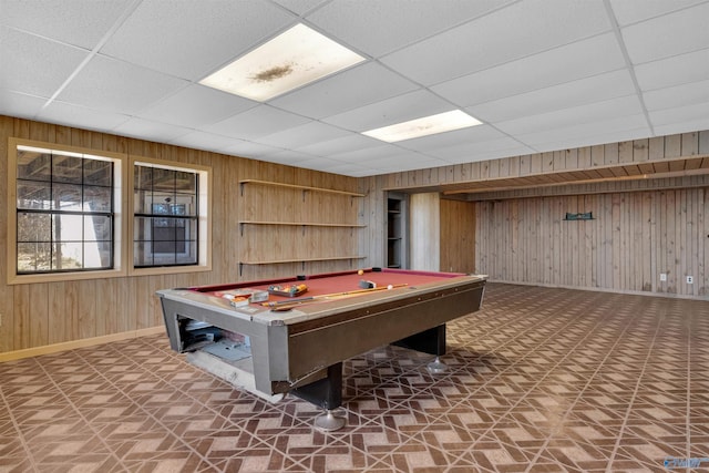 rec room with a drop ceiling, billiards, and wooden walls