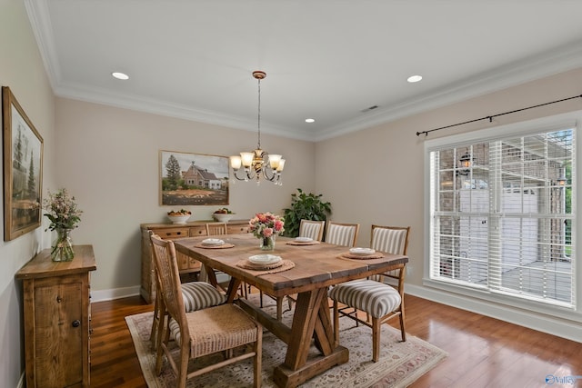 2201 Martinwood Ln SW, Decatur, AL 35603 - dining room featuring a chandelier, baseboards, wood finished floors, recessed lighting, and ornamental molding