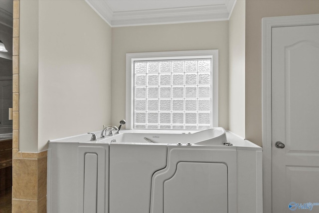 2201 Martinwood Ln SW, Decatur, AL 35603 - bathroom with ornamental molding and a garden tub
