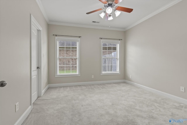 2201 Martinwood Ln SW, Decatur, AL 35603 - carpeted empty room with ornamental molding, ceiling fan, and baseboards