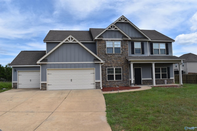 craftsman-style house with a front lawn