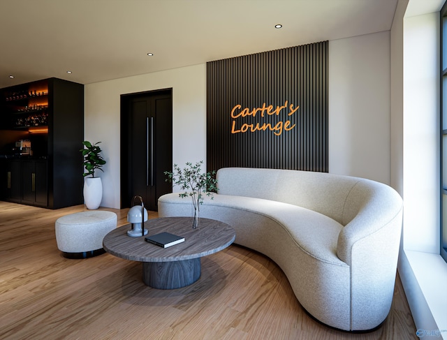 sitting room featuring hardwood / wood-style floors