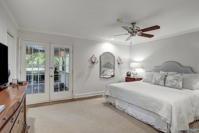 bedroom featuring french doors, crown molding, light hardwood / wood-style flooring, access to outside, and ceiling fan