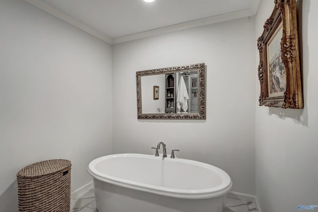 bathroom with ornamental molding and a tub