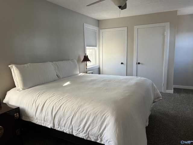 bedroom with carpet, ceiling fan, and baseboards