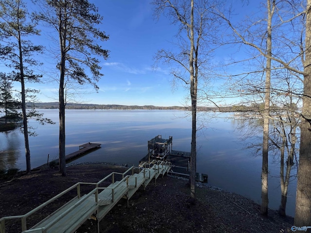 view of dock with a water view