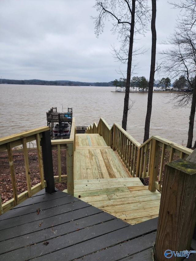 view of dock with a water view