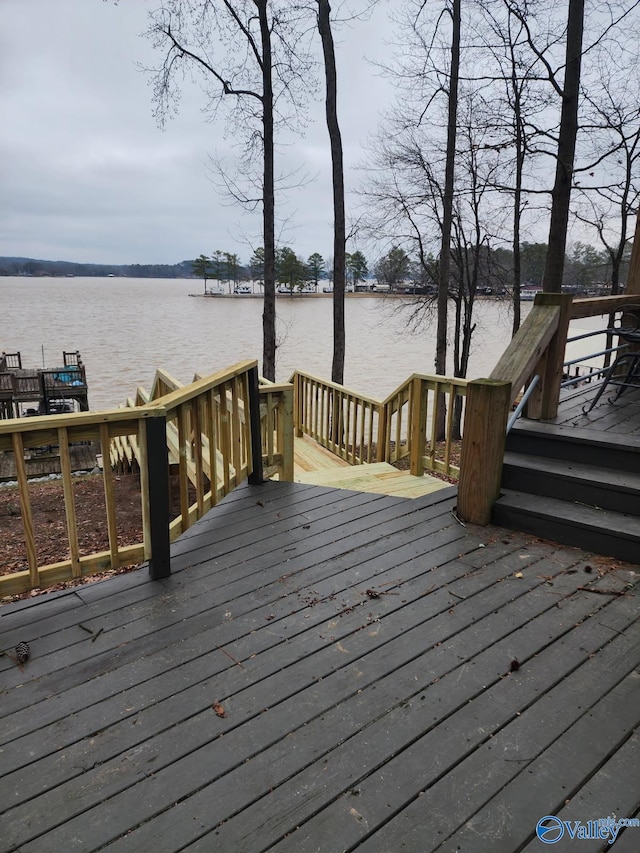 deck featuring a water view