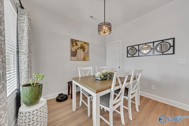 16604 Demi Dr, Athens, AL 35613 - dining area featuring light wood finished floors, baseboards, and visible vents