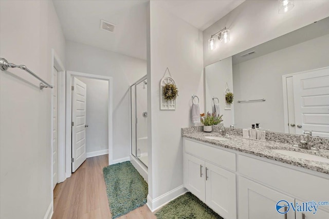 16604 Demi Dr, Athens, AL 35613 - full bathroom with a shower stall, visible vents, and a sink