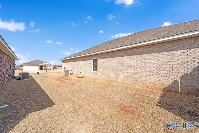 16604 Demi Dr, Athens, AL 35613 - exterior space featuring central AC and brick siding
