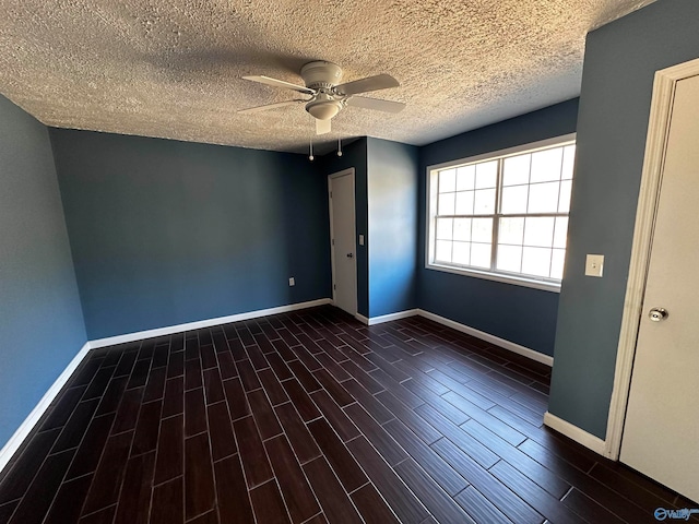 unfurnished bedroom with a textured ceiling, hardwood / wood-style floors, and ceiling fan