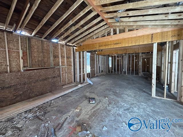 miscellaneous room featuring lofted ceiling