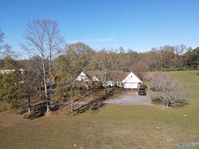 view of yard featuring a garage