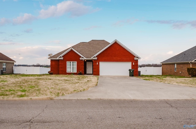 147 Hubert Rd, New Market, AL 35761 - view of front of property with concrete driveway, an attached garage, and fence